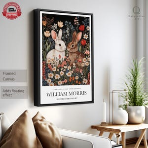 May include: Framed canvas print featuring a vintage illustration of two rabbits in a field of flowers. The text "THE ARTISTRY OF 19TH CENTURY WILLIAM MORRIS HISTORY OF BRITISH ART" is printed below the image.