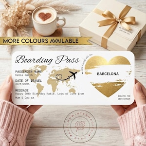May include: A personalized boarding pass design with a gold world map and heart, the text "Barcelona", and the message "Happy 30th Birthday Katie." A coffee cup and gift box are in the background. The text "More Colors Available" is also present.