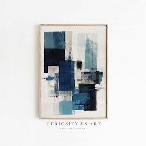 Puede incluir: Impresión de arte mural abstracto en un marco de madera. La obra de arte presenta una composición de formas rectangulares azules, azul marino y blancas. El texto "CURIOSITY ES ART" y "PRINTABLE WALL ART" está impreso en la parte inferior de la imagen.