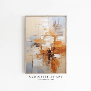 Puede incluir: Impresión artística abstracta enmarcada. La obra presenta una composición texturizada y en capas con una paleta de beige, naranja, blanco y azul. El texto "CURIOSITY ES ART PRINTABLE WALL ART" está en la parte inferior.