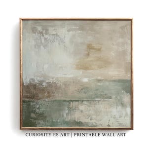 May include: Abstract landscape painting in a gold frame. The artwork features a muted color palette of greens, browns, and creams, with visible brushstrokes creating a textured effect. The text "CURIOSITY ES ART | PRINTABLE WALL ART" is at the bottom.