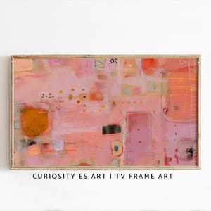 Könnte beinhalten: Abstrakter Kunstdruck in einem Holzrahmen. Das Kunstwerk zeigt eine Mischung aus Rosa, Orange und Schwarz mit geometrischen Formen und Texturen. Der Text "CURIOSITY ES ART I TV FRAME ART" befindet sich unten.
