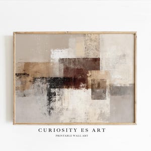 Puede incluir: Impresión artística abstracta en un marco de madera. La obra presenta una paleta de colores neutros con formas rectangulares beige, marrón y negras. El texto "CURIOSITY ES ART PRINTABLE WALL ART" está impreso en la parte inferior.