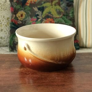 Two-tone brown and beige ceramic planter