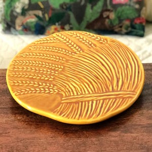 Vallauris keramische tafelonderzetter met tarweoren