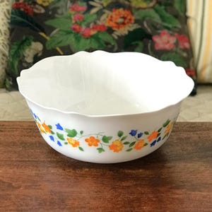 Vintage Arcopal white opaline salad bowl with orange, blue and green decor