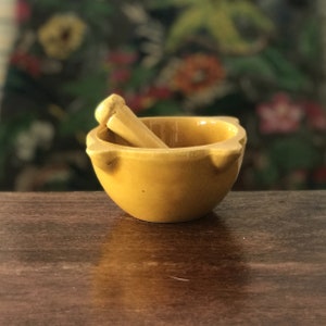 Small ceramic mortar from Vallauris with its pestle signed Aegitna