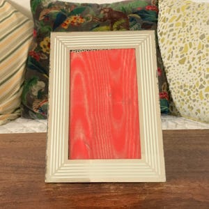 Small mirror photo frame with snake pattern back 18 x 12.5 cm