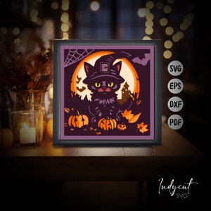 May include: A framed Halloween-themed art piece featuring a black cat wearing a witch hat, surrounded by pumpkins, bats, and a full moon. The artwork is in shades of purple, orange, and black, with the text "SVG, EPS, DXF, PDF" on the right.