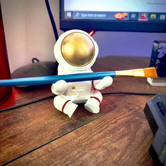 Helping Astronaut Statue