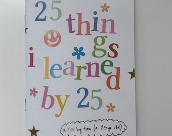 May include: A white book with a colorful title that reads "25 things I learned by 25". The book has a gold star on the cover and a handwritten note that says "a list by tom (a 25 yr old)".