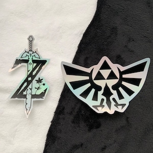 La leggenda di Zelda logo hyrule inchiostro nero adesivo olografico regalo collegamento Zelda fustellato stciker rottami prenotazione divertente regalo fatto a mano