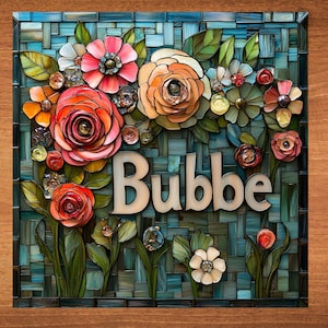 May include: A mosaic art piece with a floral design and the word "Bubbe" in the center. The flowers are made of colorful glass tiles and are arranged in a cluster. The background is a blue and green mosaic.