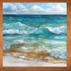 May include: An abstract ocean painting with turquoise waves and a sandy beach. The artwork features white foamy crests, gold accents, and a cloudy sky. The painting is framed in a wooden border.