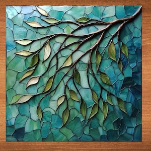 May include: Stained glass artwork featuring a tree branch with leaves. The leaves are shades of green and cream, set against a mosaic background of teal and blue. The artwork is framed in a wooden border.