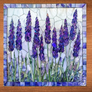 May include: A mosaic artwork depicting a cluster of purple lavender flowers with green stems against a white background. The artwork is framed in a wooden frame with a blue and white border.
