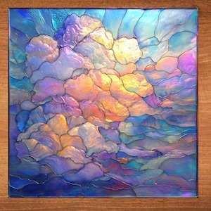May include: A stained glass artwork depicting a colorful, abstract cloud formation with shades of blue, purple, pink, and yellow.