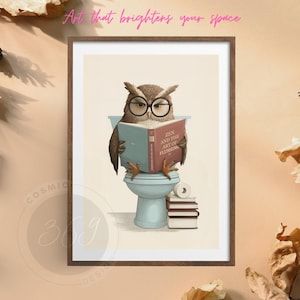 May include: Framed art print depicting an owl in spectacles reading a book titled "Zen and the Art of Flushing" whilst seated on a toilet. The artwork has a light colour palette with the text "Art that brightens your space".