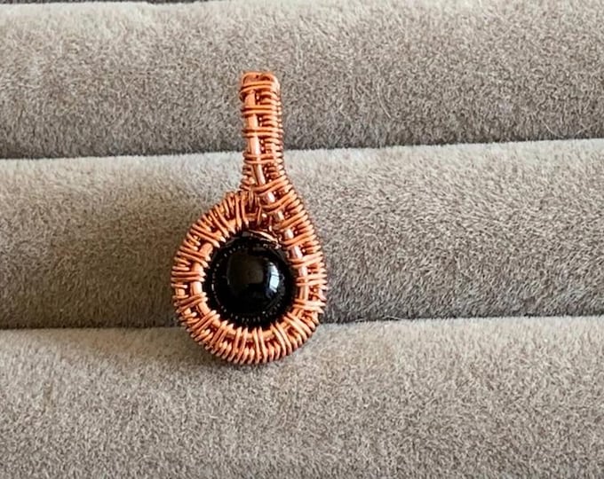 Handcrafted Pink Copper Pendant with Black Onyx – Strength, Protection, and Essential Elegance