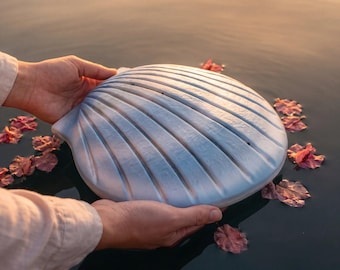 Biologisch afbreekbare asurnen van Shell in aquablauw.