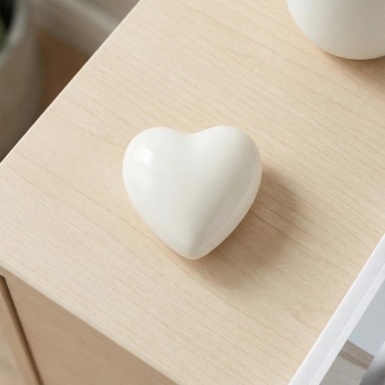 Heart Keepsake Urn for Ashes in White on Table