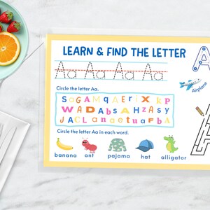 May include: A yellow and white printable worksheet with the letter "A" in uppercase and lowercase. The worksheet includes tracing lines, a word search, and a maze. The words "LEARN & FIND THE LETTER" are at the top of the worksheet.