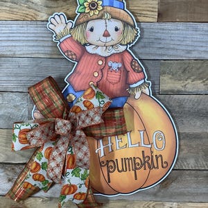 Scarecrow on a Pumpkin