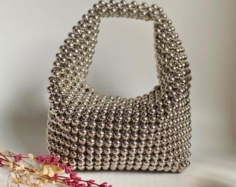 Bolso de mano plateado metalizado, bolso de noche y cartera de mano con cuentas hechas a mano, accesorio llamativo.