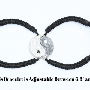 May include: Two black adjustable friendship bracelets with a silver yin yang charm. This Bracelet is Adjustable Between 6.3" and 12.6"