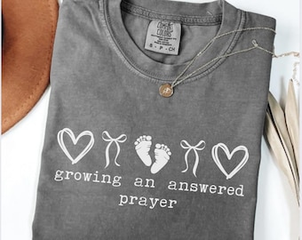 Comfort Colors® Growing An Answered Prayer Christian Mom Shirt, Coquette Pregnancy Reveal, Announcement Mom To Be Tee, Baby Shower Gift