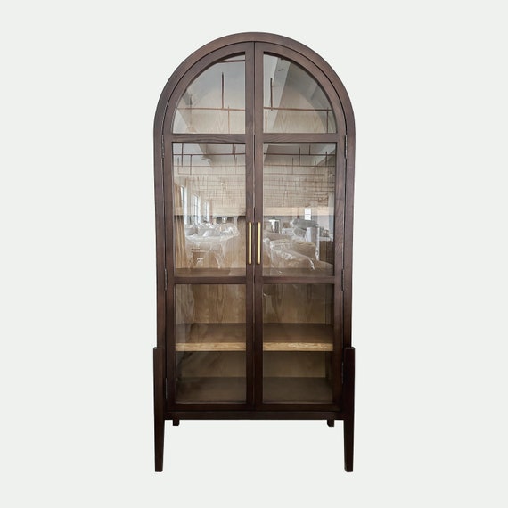 Arched top curio cabinet deals