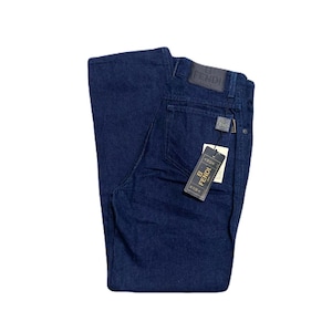 May include: Dark blue denim jeans with a leather Fendi label on the back and a hang tag. The jeans are folded and appear unworn.