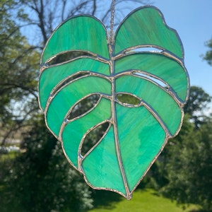 Teal monstera leaf stained glass