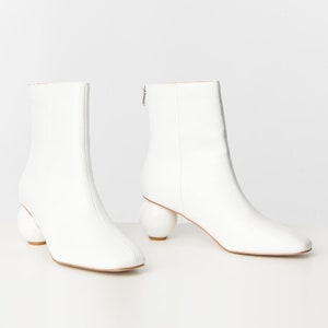 Unique Vintage White Leatherette Ball Heel Booties image 1