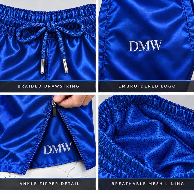 May include: Royal blue athletic shorts featuring a braided drawstring waistband, an embroidered DMW logo, a side ankle zipper detail, and a breathable mesh interior lining. The fabric has a smooth, satin-like finish throughout the garment.