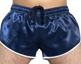 Pasarela hacia lo retro: pantalones cortos deportivos de corte alto de satén de nailon azul marino inspirados en el Sprint