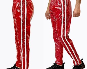 Libérez votre style actif avec notre pantalon de jogging sport en nylon PU rouge brillant.
