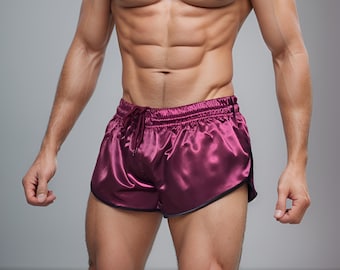May include: A pair of burgundy satin athletic shorts with a black trim. The shorts have a drawstring waistband and a relaxed fit.