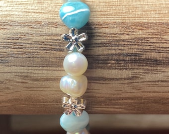 High quality blue heart shaped larimar, seed pearls elastic stretch bracelet. Larimar brings serenity and encourages “go with the flow”