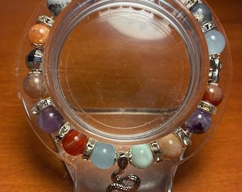 Taylor Swift fans!! Genuine crystal bracelet representing all of Taylor Swift's albums. Silver with rhinestone spacers