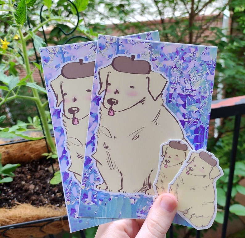 May include: Three stickers featuring a cartoon golden retriever wearing a brown hat. The stickers are on a purple and blue background with a watercolor effect. The stickers are different sizes.
