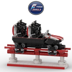 May include: A model roller coaster with a black and red car, white seats, and a red track. The coaster has a logo in the upper center that says "moya nomill o entertainment". The coaster is a toy.