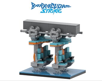 May include: A Lego model of a ride with the text "Barracuda Strike" above it. The model features two identical structures with gray, teal, and orange components, mounted on a blue base. The top section is gray.