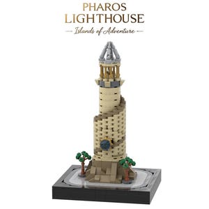 May include: A Lego model of the Pharos Lighthouse, one of the Seven Wonders of the Ancient World. The lighthouse is built with tan and gray Lego bricks and features a spiral staircase and a small clock face. The model is set on a black base with a small green tree on each side.