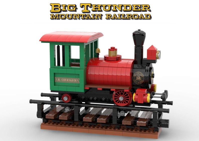 May include: A red and green toy train engine with a black smokestack and a sign that reads "Big Thunder Mountain Railroad". The engine has a green passenger car with the words "J.R. Courageous" on the side.