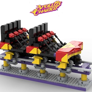 May include: A Lego model of the Apollo's Chariot roller coaster at Busch Gardens Williamsburg. The model is made of black, red, yellow, and purple Lego bricks. The coaster train is on a track with supports. The coaster train has a sign that says "Apollo's Chariot".