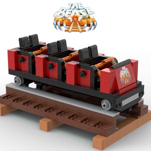 May include: A red and black Lego model of a roller coaster train with the words "The Beast" on the side. The train is on a track made of brown Lego bricks.