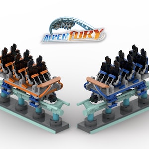 May include: Two miniature roller coaster train models constructed from building blocks, one with orange accents and one with blue accents, positioned on light blue tracks. Above the models, the text ALPEN FURY is displayed with a graphic of a coaster.