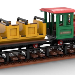May include: A red and green toy train with a yellow passenger car. The train has a black chimney and wheels and says "Le Courageux" on the side. The train is on a brown track.