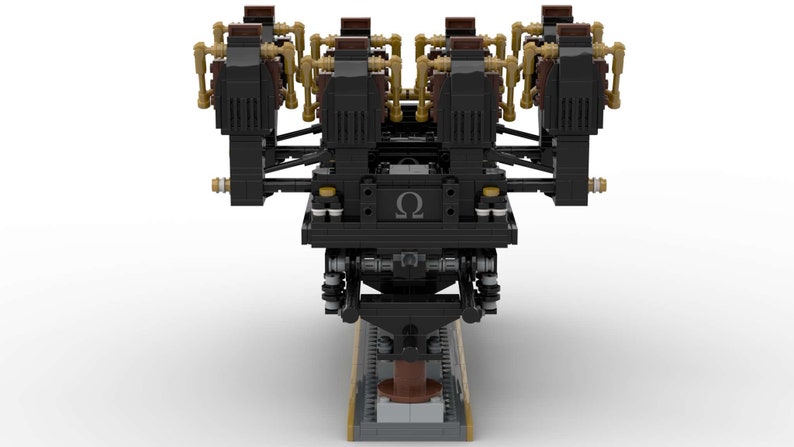 K&ouml;nnte beinhalten: Ein schwarz-goldenes Modell eines Achterbahnwagens, konstruiert aus Spielzeugbausteinen. Der Wagen verf&uuml;gt &uuml;ber mehrere Sitzreihen und komplizierte mechanische Details, einschlie&szlig;lich des griechischen Buchstabens Omega.